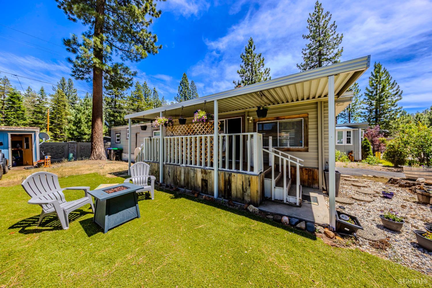 1080 Julie Lane, Unit 140 South Lake Tahoe, CA 96150 - Photo 3 of 20 a view of a backyard with a patio