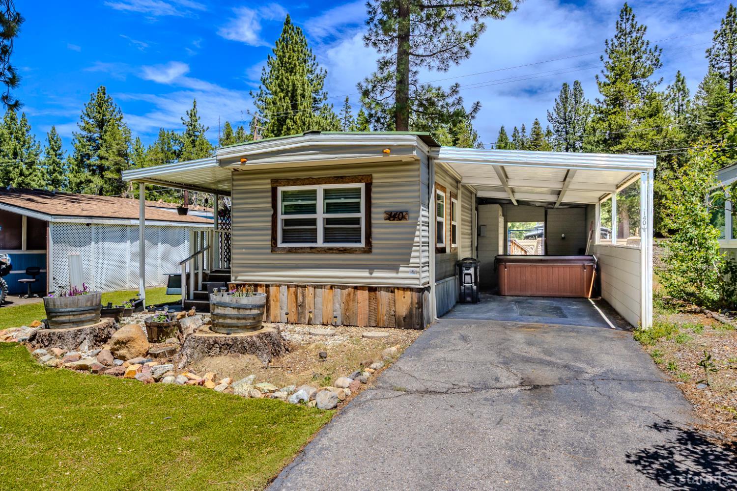 1080 Julie Lane, Unit 140 South Lake Tahoe, CA 96150 - Photo 4 of 20 a view of a house with a patio