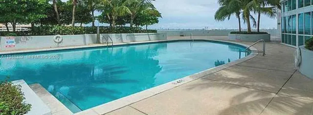 a view of outdoor space yard swimming pool and seating