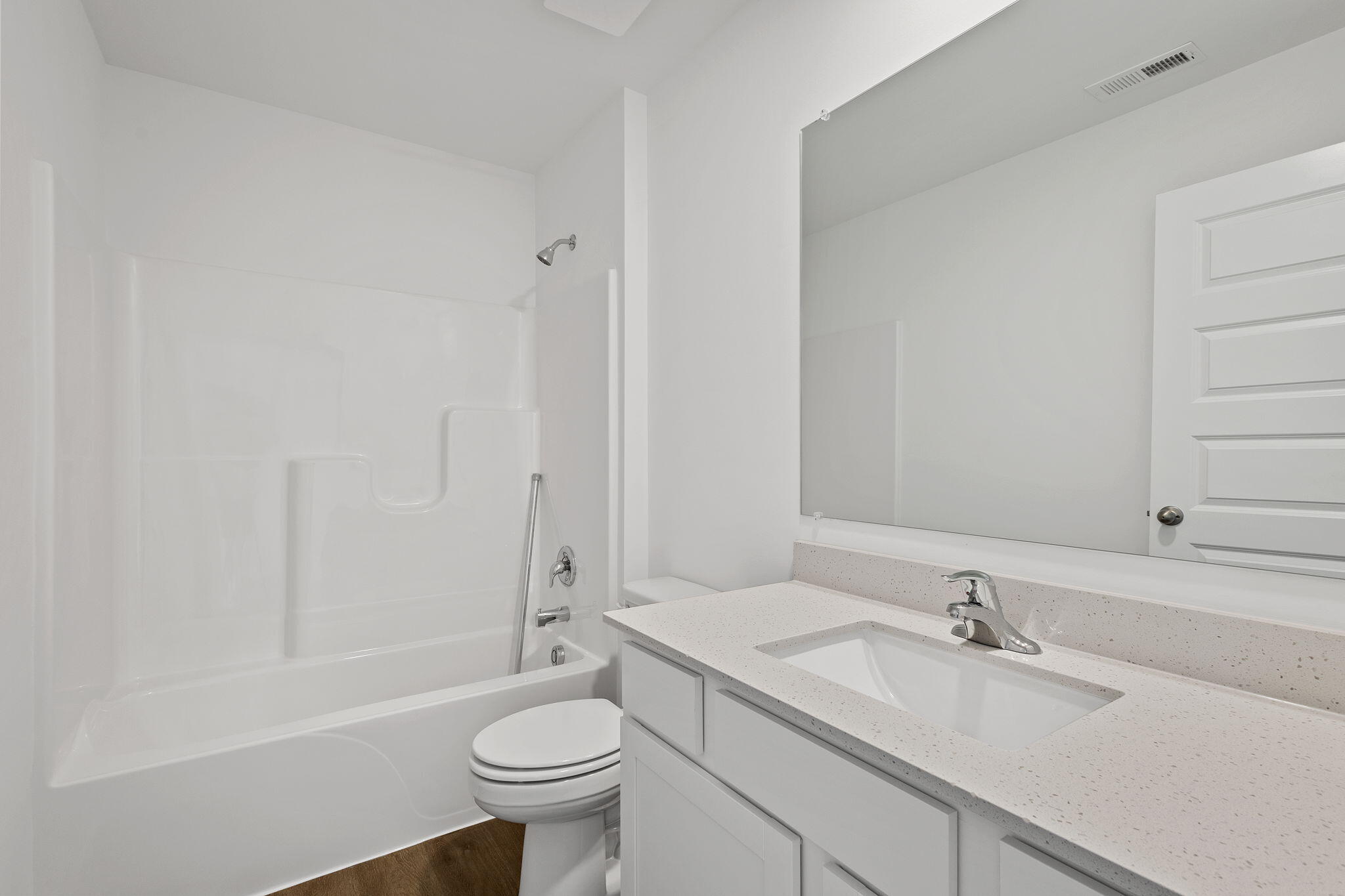 7347 West 107th Place Crown Point, IN 46307 - Photo 24 of 26 a bathroom with a sink and a toilet