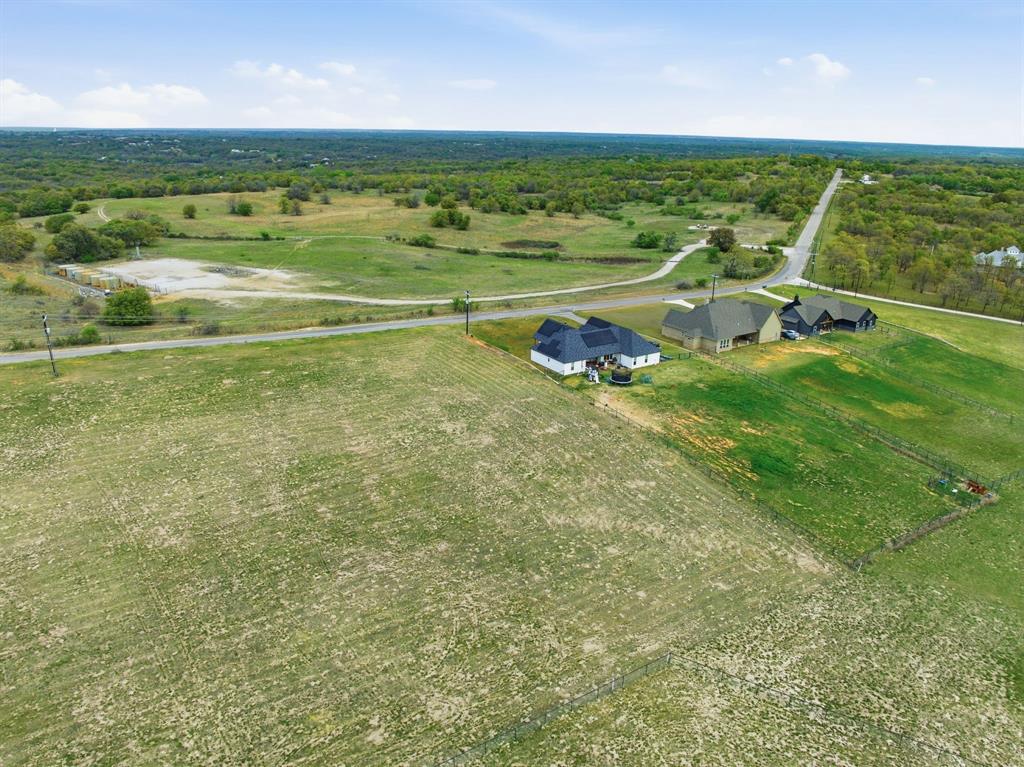 Lot 8 North Agnes Road Springtown, TX 76082 - Photo 14 of 32 a view of a lake with a beach