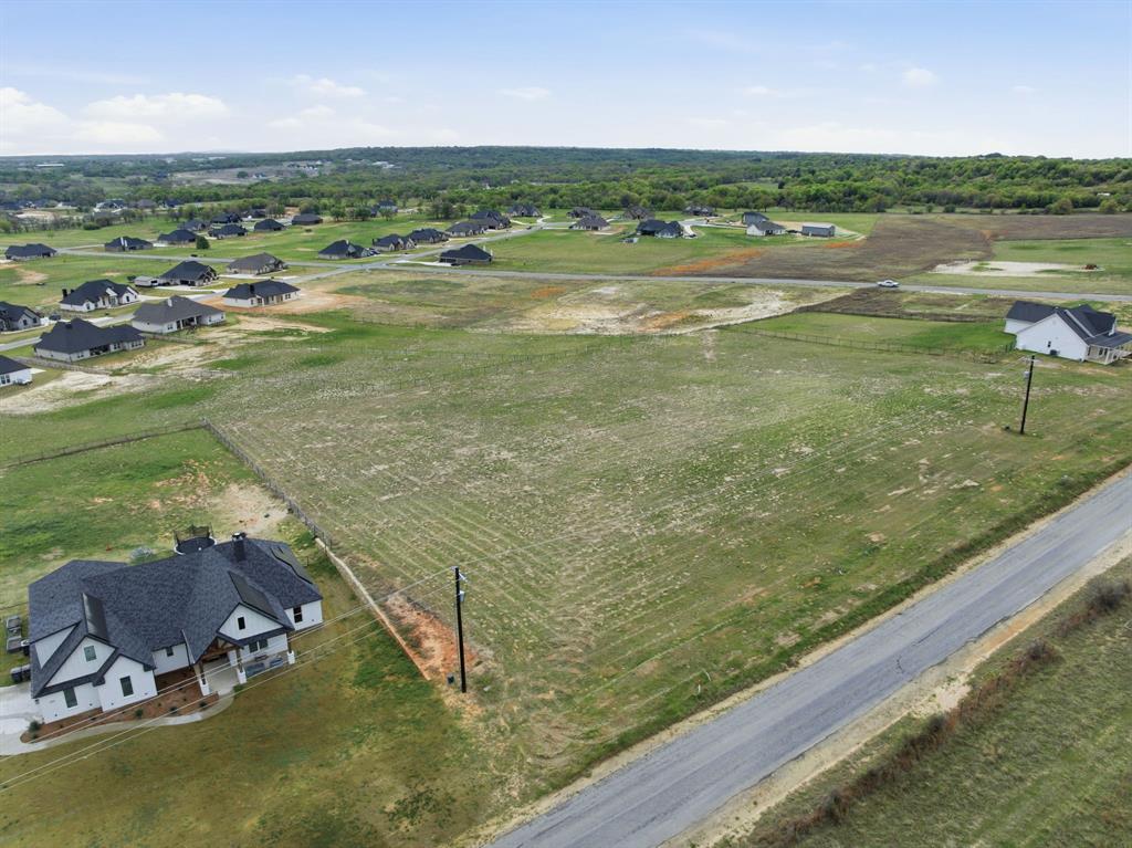 Lot 8 North Agnes Road Springtown, TX 76082 - Photo 15 of 32 a view of a lake with a city