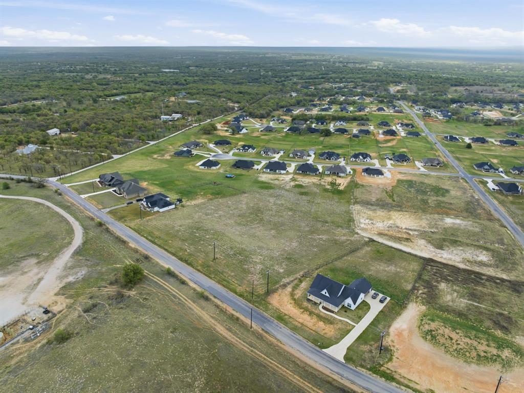 Lot 8 North Agnes Road Springtown, TX 76082 - Photo 23 of 32 an aerial view of residential houses with outdoor space