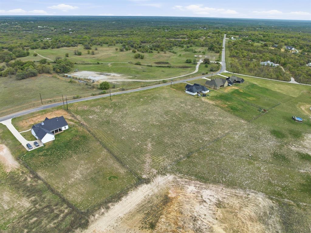 Lot 8 North Agnes Road Springtown, TX 76082 - Photo 10 of 32 a view of a field with an ocean
