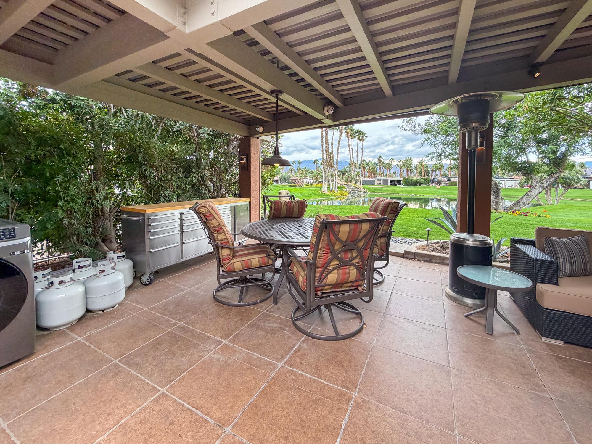 80394 Ave 48, Unit 281 Indio, CA 92201 - Photo 1 of 15 a view of a patio with chairs and plants