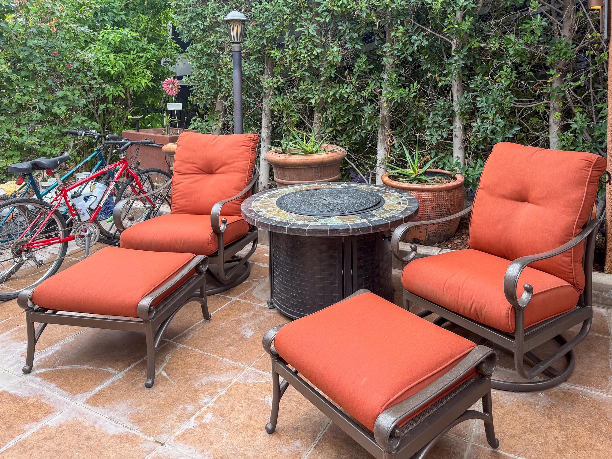 80394 Ave 48, Unit 281 Indio, CA 92201 - Photo 2 of 15 a blue swimming pool with a chairs and a table