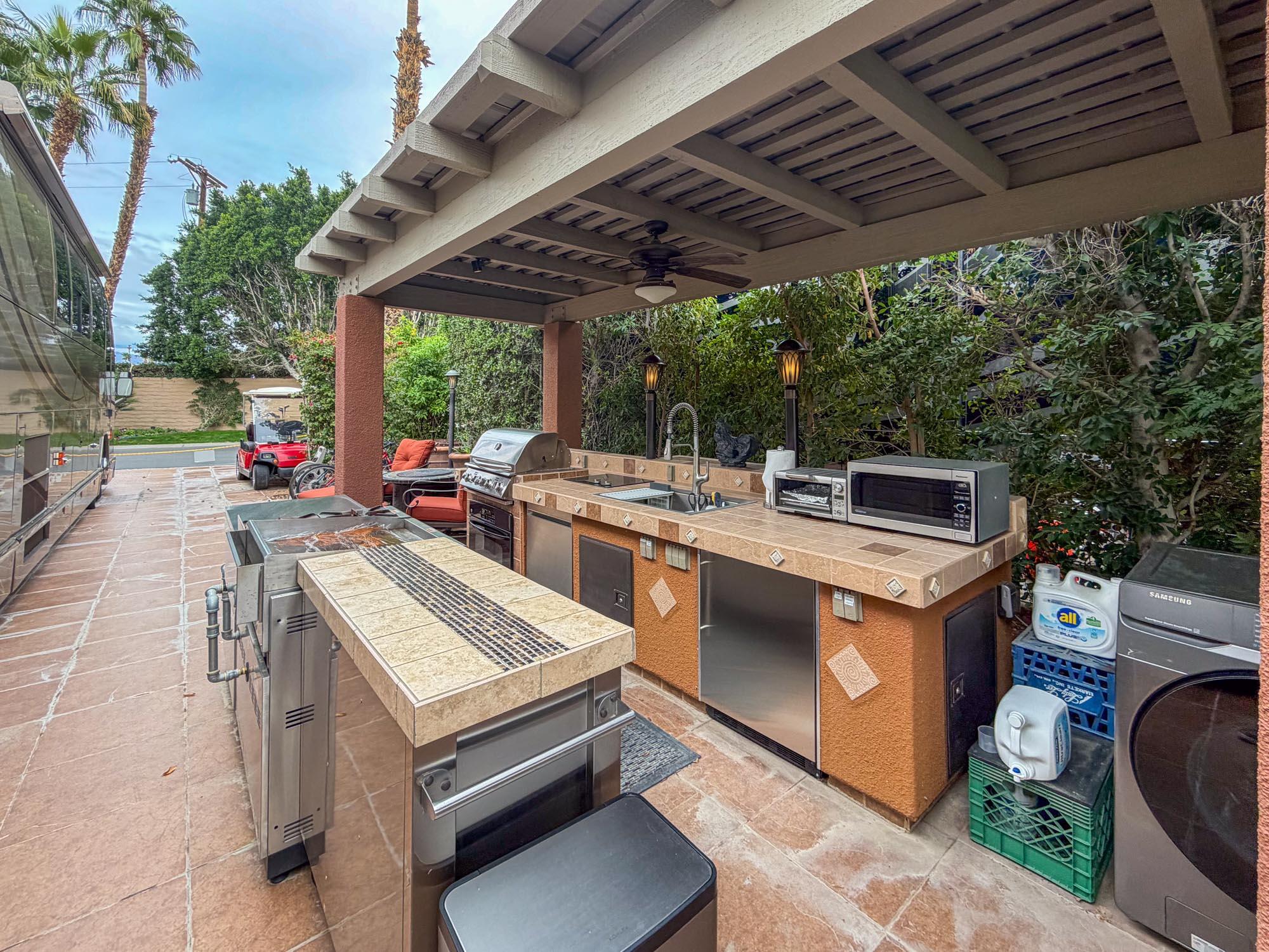 80394 Ave 48, Unit 281 Indio, CA 92201 - Photo 5 of 15 a view of a chairs and table in the patio