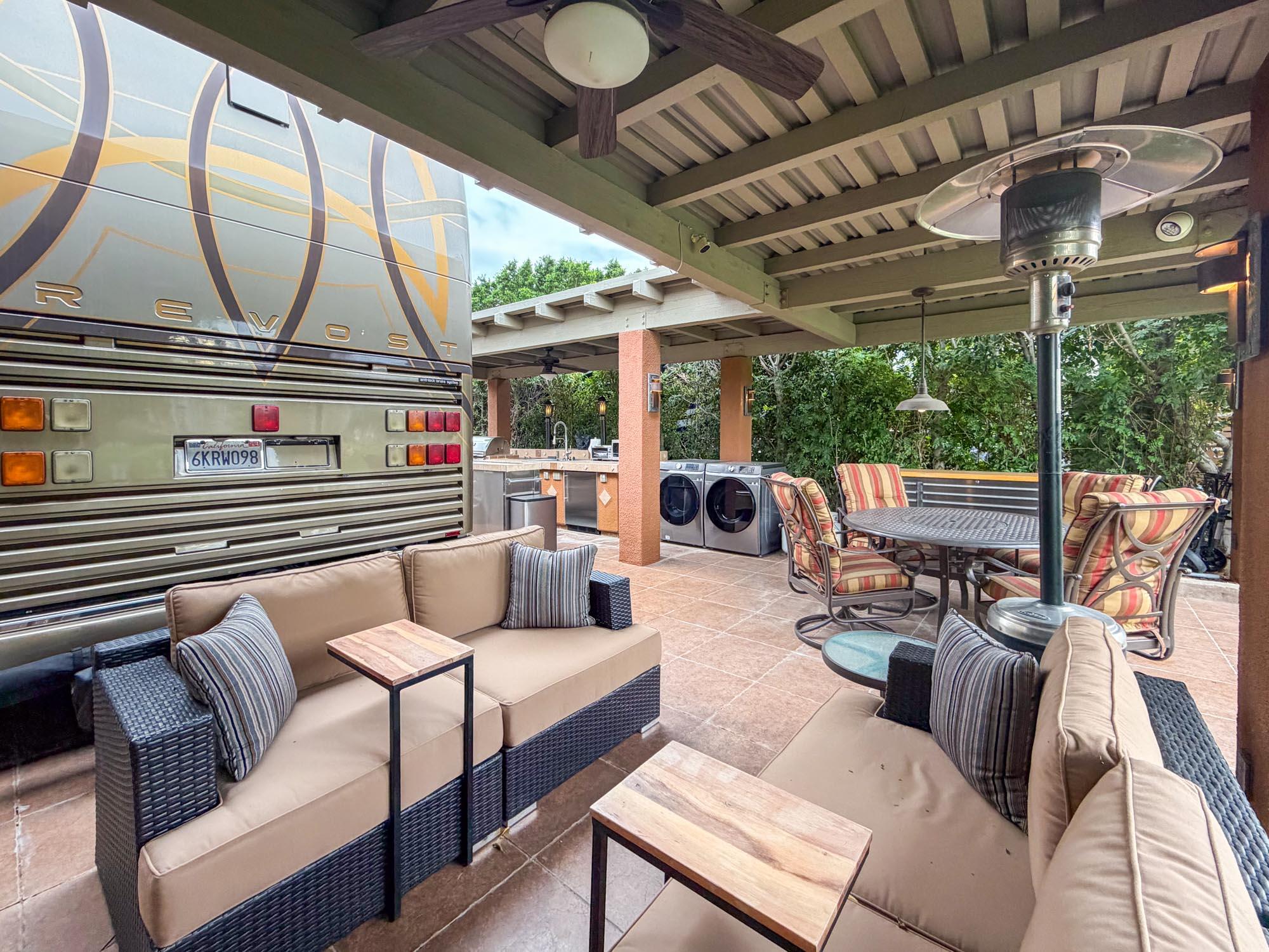 80394 Ave 48, Unit 281 Indio, CA 92201 - Photo 10 of 15 a living room with furniture a table and chairs