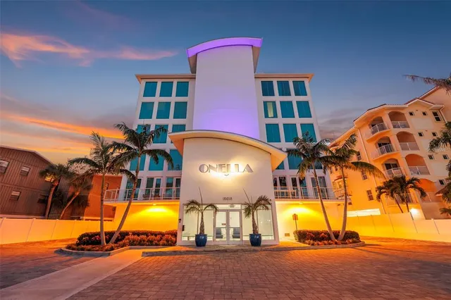 a view of a swimming pool with a seating space