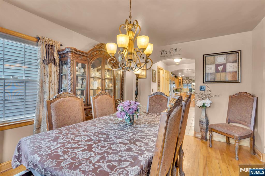 104 Prospect Street Nutley, NJ 07110 - Photo 20 of 41 a bedroom with a bed mirror and window