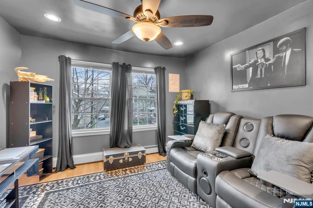 104 Prospect Street Nutley, NJ 07110 - Photo 21 of 41 a living room with furniture and a window