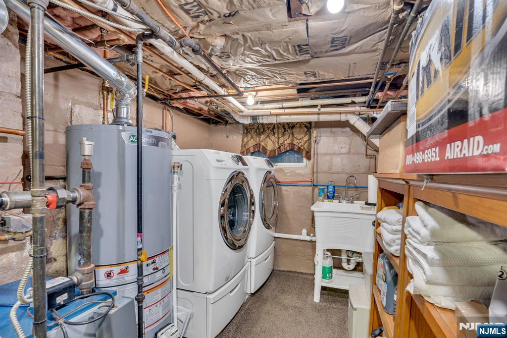 104 Prospect Street Nutley, NJ 07110 - Photo 34 of 41 a utility room with dryer and washer