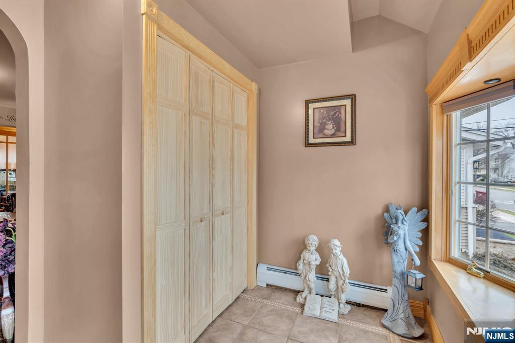 104 Prospect Street Nutley, NJ 07110 - Photo 4 of 41 a view of a room with lounge chair and windows