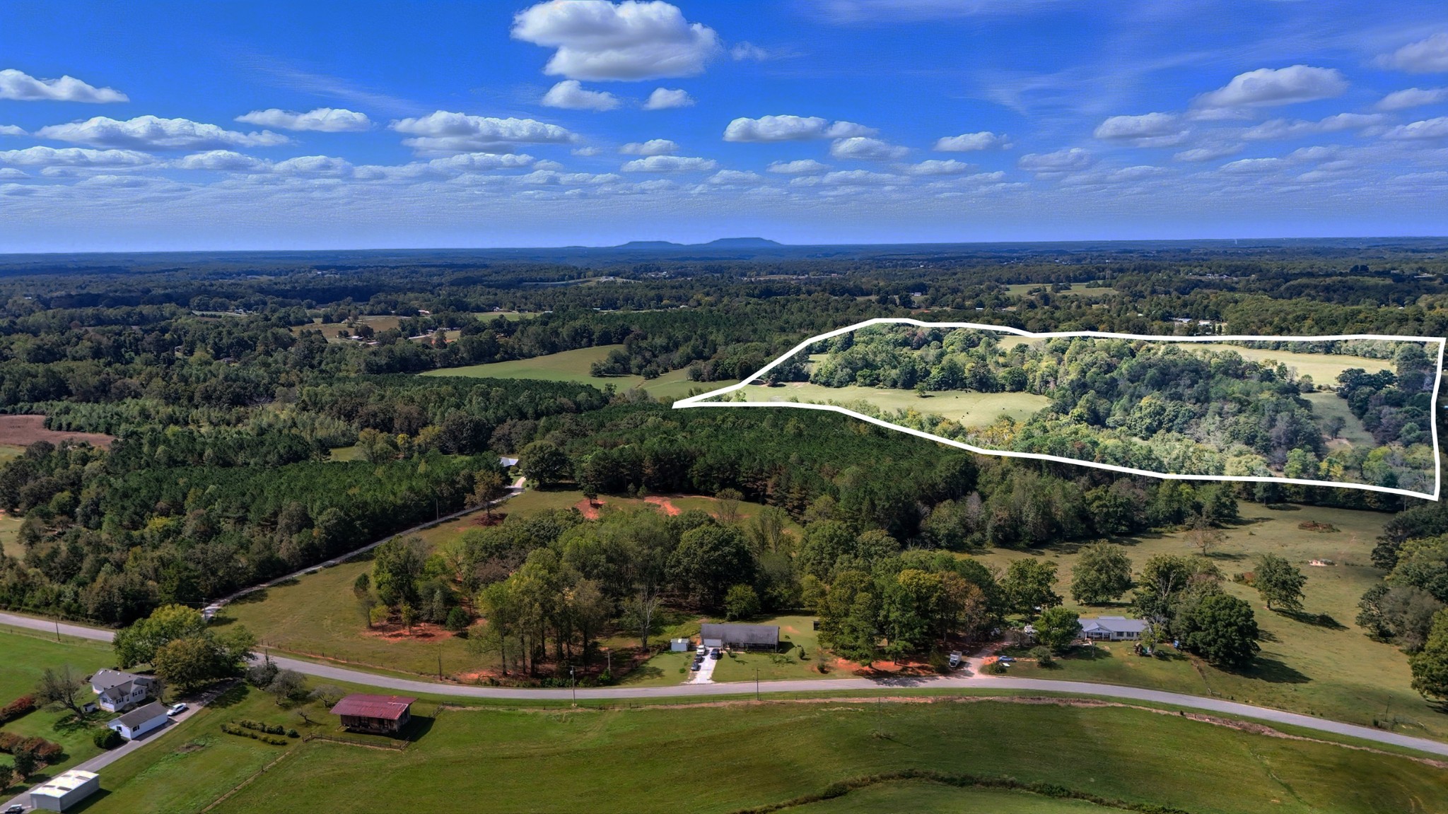 0 Jenkins Road Sparta, TN 38583 - Photo 3 of 32 a view of a lake with a mountain
