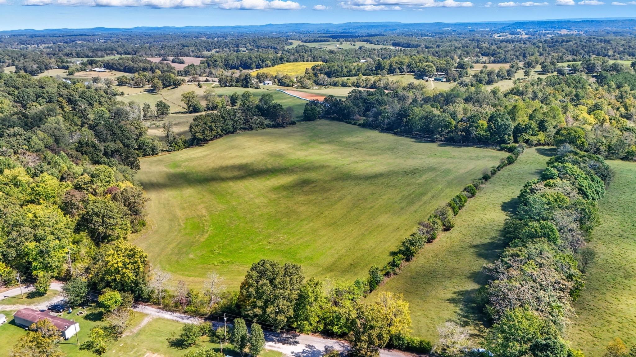 0 Jenkins Road Sparta, TN 38583 - Photo 8 of 32 an aerial view of residential houses with outdoor space and trees