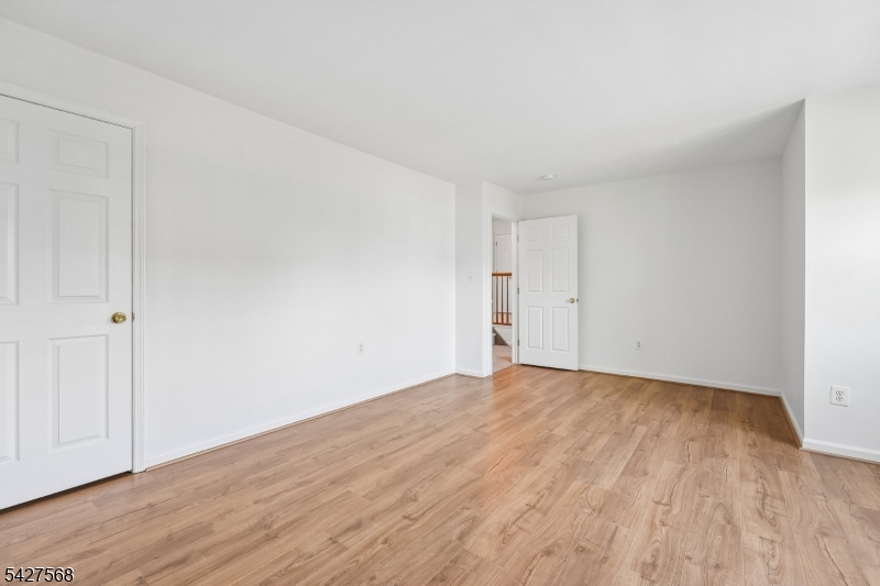 1 Leigh Road Hillsborough, NJ 08844 - Photo 20 of 35 a view of empty room with wooden floor