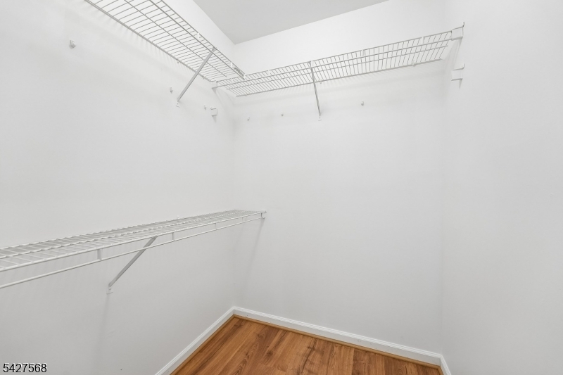 1 Leigh Road Hillsborough, NJ 08844 - Photo 24 of 35 a view of a room with racks on the wall