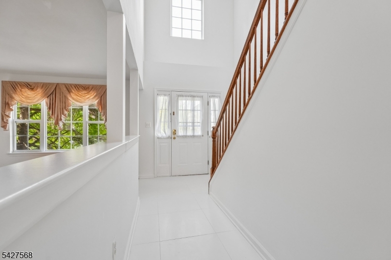 1 Leigh Road Hillsborough, NJ 08844 - Photo 5 of 35 a view of staircase with white walls and windows