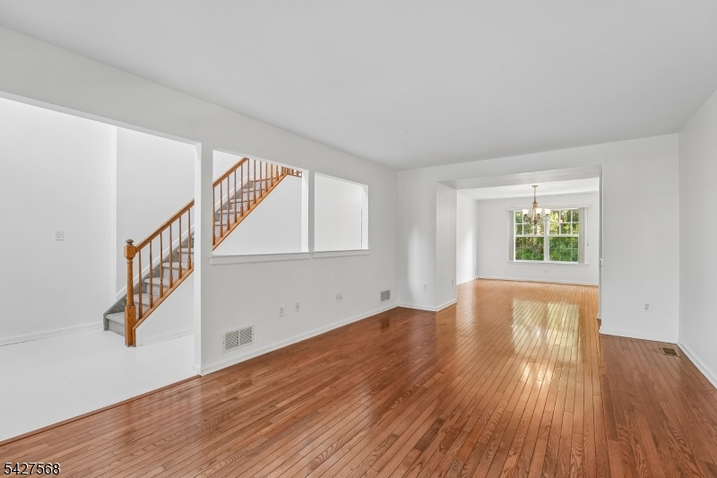 1 Leigh Road Hillsborough, NJ 08844 - Photo 7 of 35 a view of an entryway with wooden floor