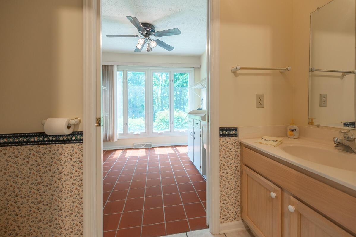 6340 Bale Kenyon Road Lewis Center, OH 43035 - Photo 20 of 41 Half bath w/ pocket doors