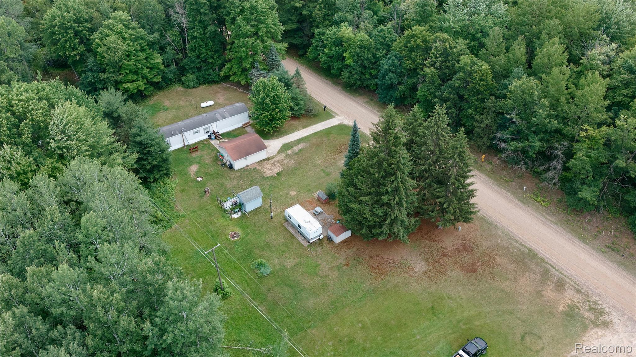 1900 Hay Road Beaverton, MI 48612 - Photo 4 of 8 dji_fly_20260702_103912_0410_1783005004269_photo.jpeg