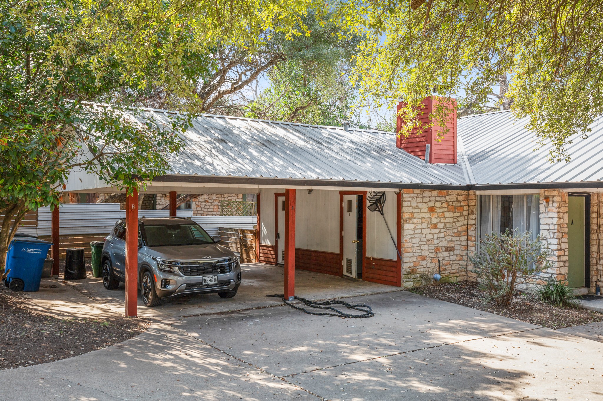 5402 Brompton Circle Austin, TX 78745 - Photo 8 of 30 The two-car covered carport provides protected and convenient parking.