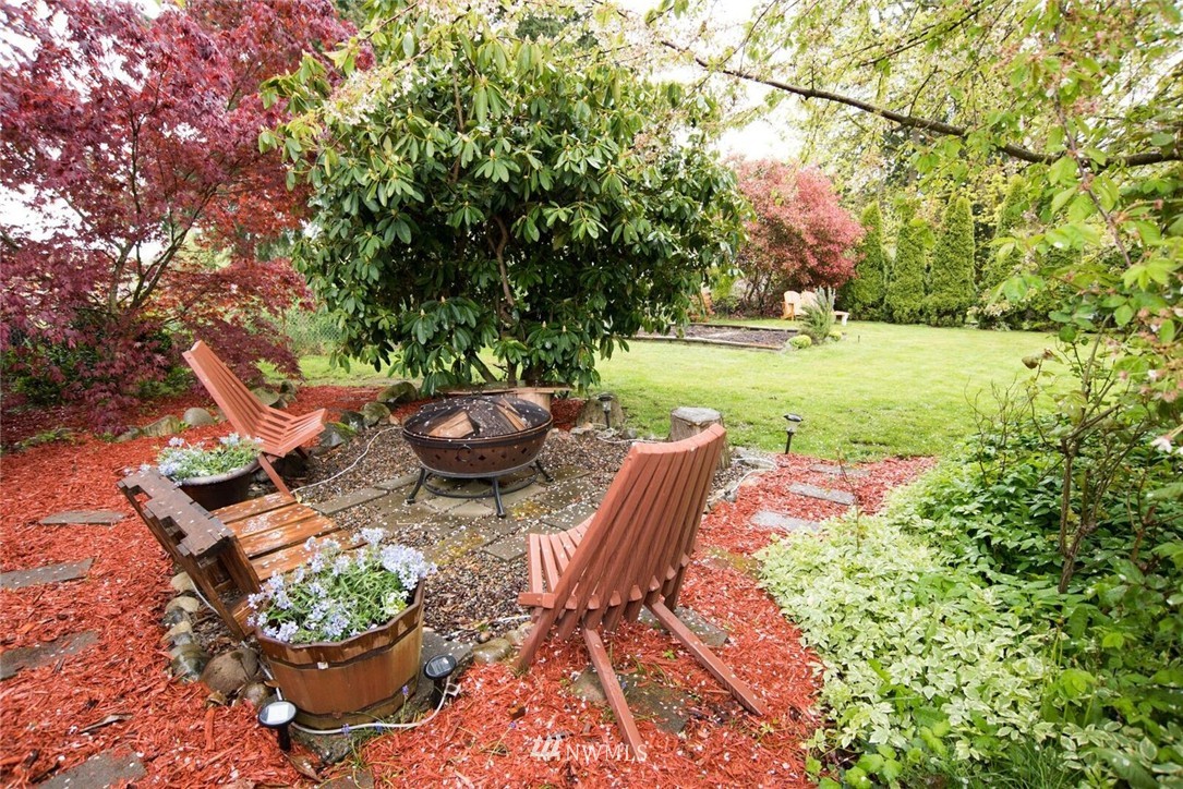11510 Southeast 178th Place Renton, WA 98055 - Photo 16 of 18 a view of a backyard with sitting area