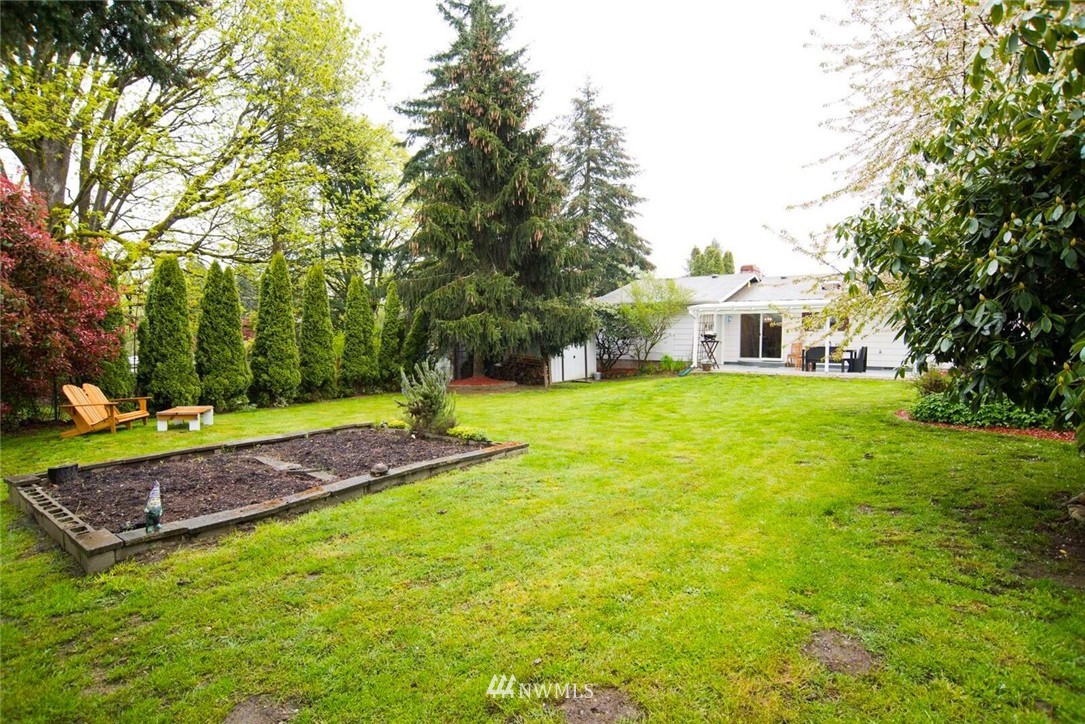 11510 Southeast 178th Place Renton, WA 98055 - Photo 17 of 18 a view of a house with a yard and sitting area