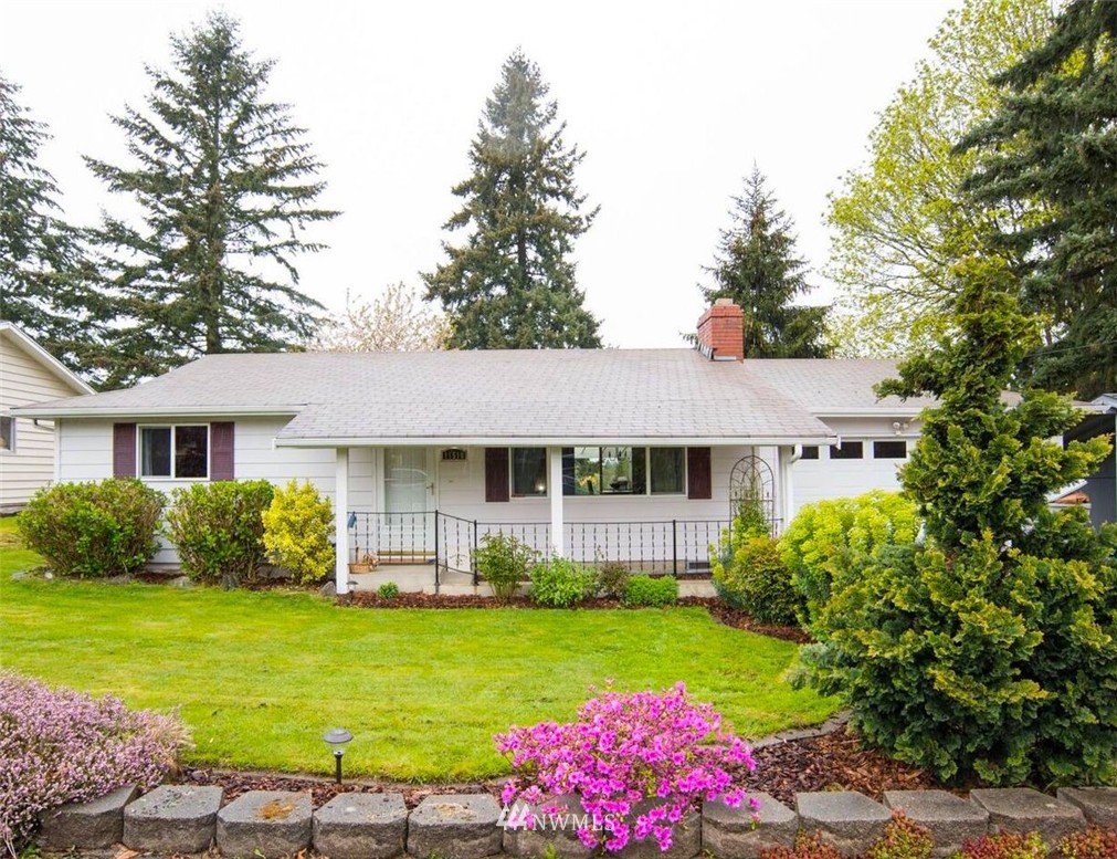 11510 Southeast 178th Place Renton, WA 98055 - Photo 18 of 18 a front view of a house with garden