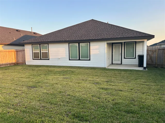 a front view of house with yard