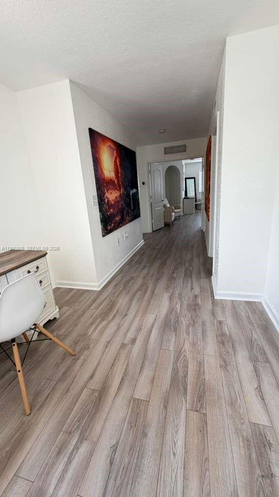 14065 Southwest 278th Street Homestead, FL 33032 - Photo 15 of 30 a view of a livingroom with wooden floor