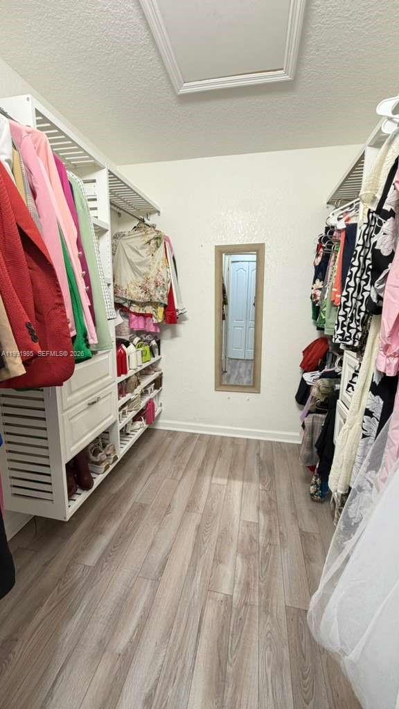 14065 Southwest 278th Street Homestead, FL 33032 - Photo 21 of 30 a view of a room with lots of stuff and hardwood floor