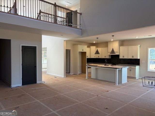 3083 W Highway Bowdon, GA 30108 - Photo 11 of 14 a large bathroom with a large mirror vanity and a sink
