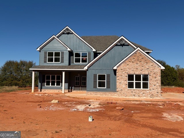 3083 W Highway Bowdon, GA 30108 - Photo 3 of 14 a front view of a house with large windows