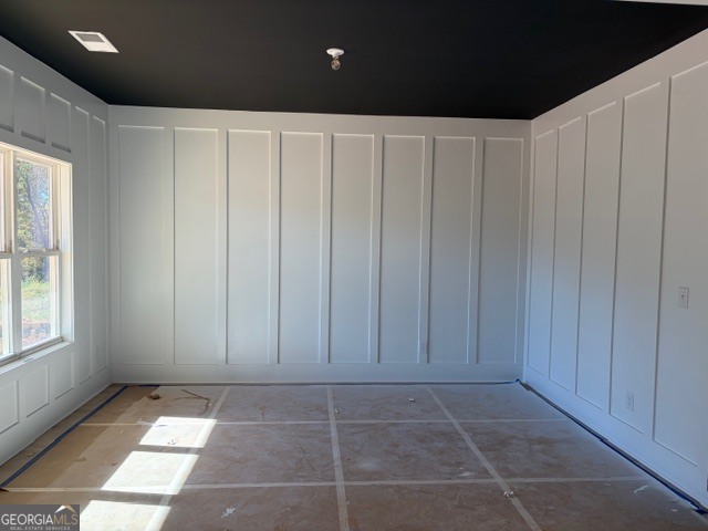 3083 W Highway Bowdon, GA 30108 - Photo 5 of 14 a view of an empty room with a window
