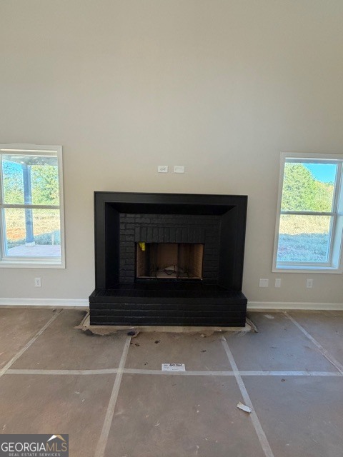 3083 W Highway Bowdon, GA 30108 - Photo 10 of 14 a living room with a fireplace