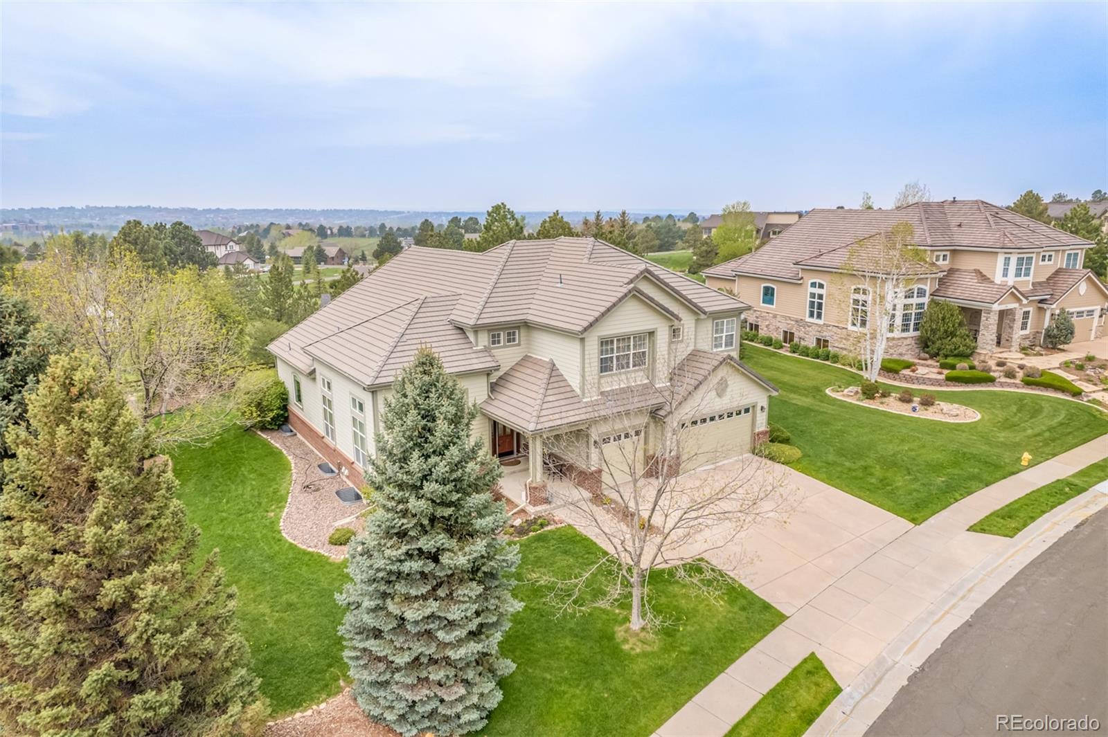 21923 East Ridge Trail Circle Aurora, CO 80016 - Photo 3 of 40 an aerial view of a house