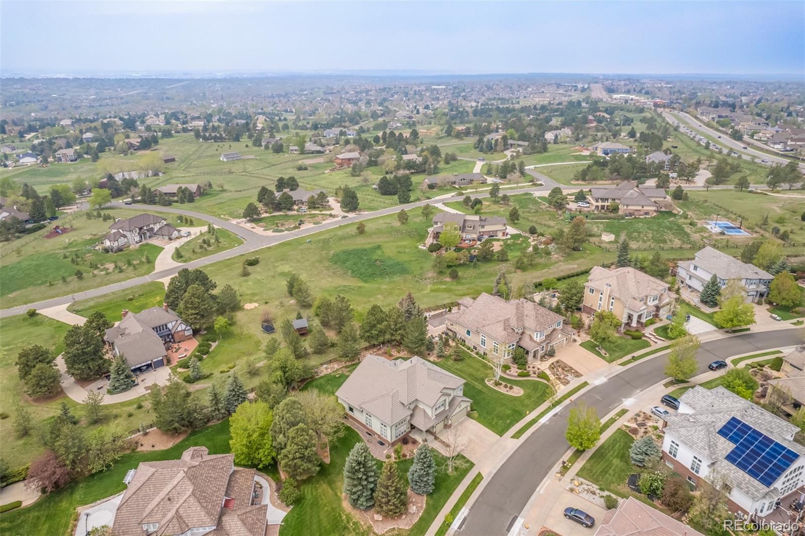 21923 East Ridge Trail Circle Aurora, CO 80016 - Photo 37 of 40 an aerial view of a residential houses with outdoor space