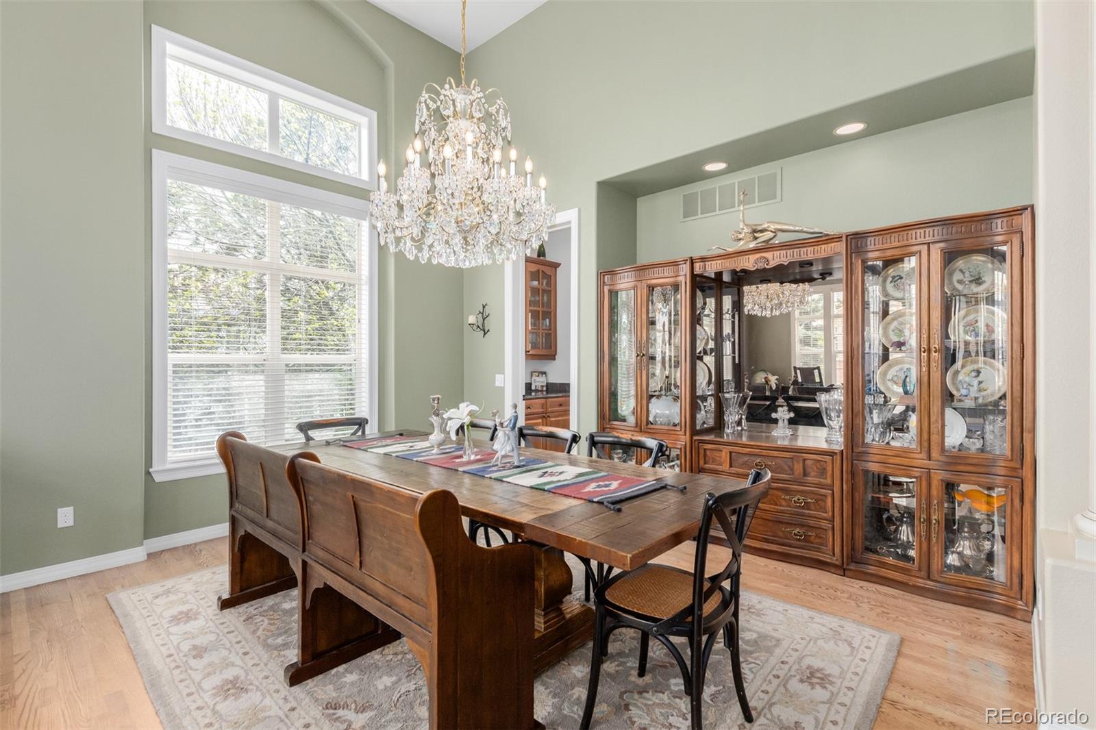21923 East Ridge Trail Circle Aurora, CO 80016 - Photo 10 of 40 a view of a dining room with furniture window and outside view