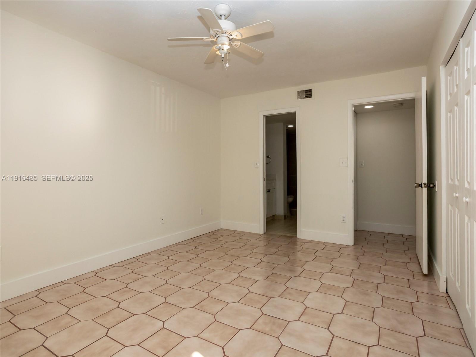 9761 Southwest 138th Avenue, Unit HC1R Miami, FL 33186 - Photo 24 of 35 Second Bedroom
