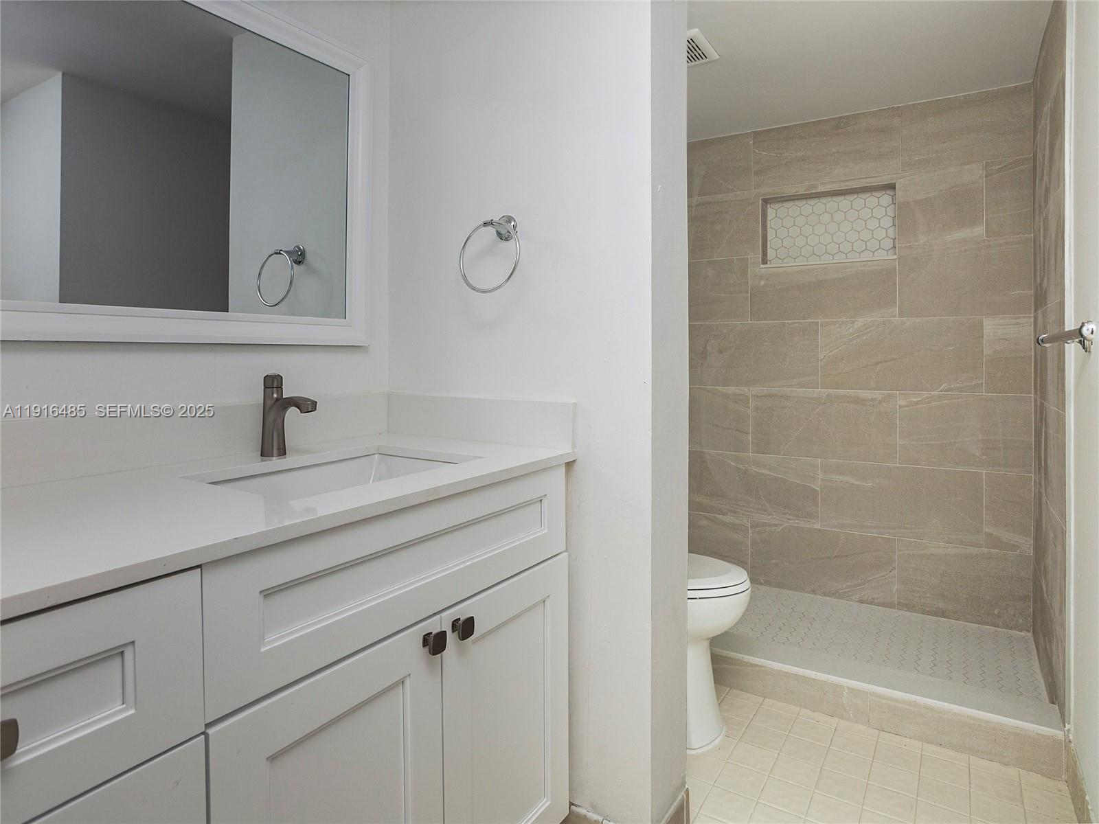 9761 Southwest 138th Avenue, Unit HC1R Miami, FL 33186 - Photo 27 of 35 Second Bathroom