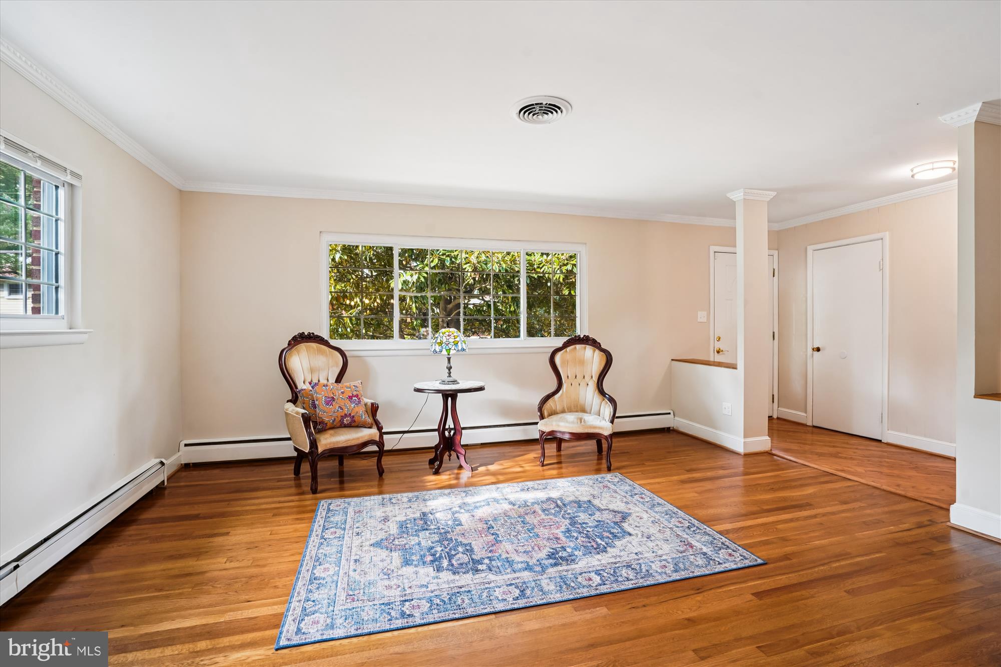 6216 Rockhurst Road Bethesda, MD 20817 - Photo 11 of 52 a living room with furniture rug and a window
