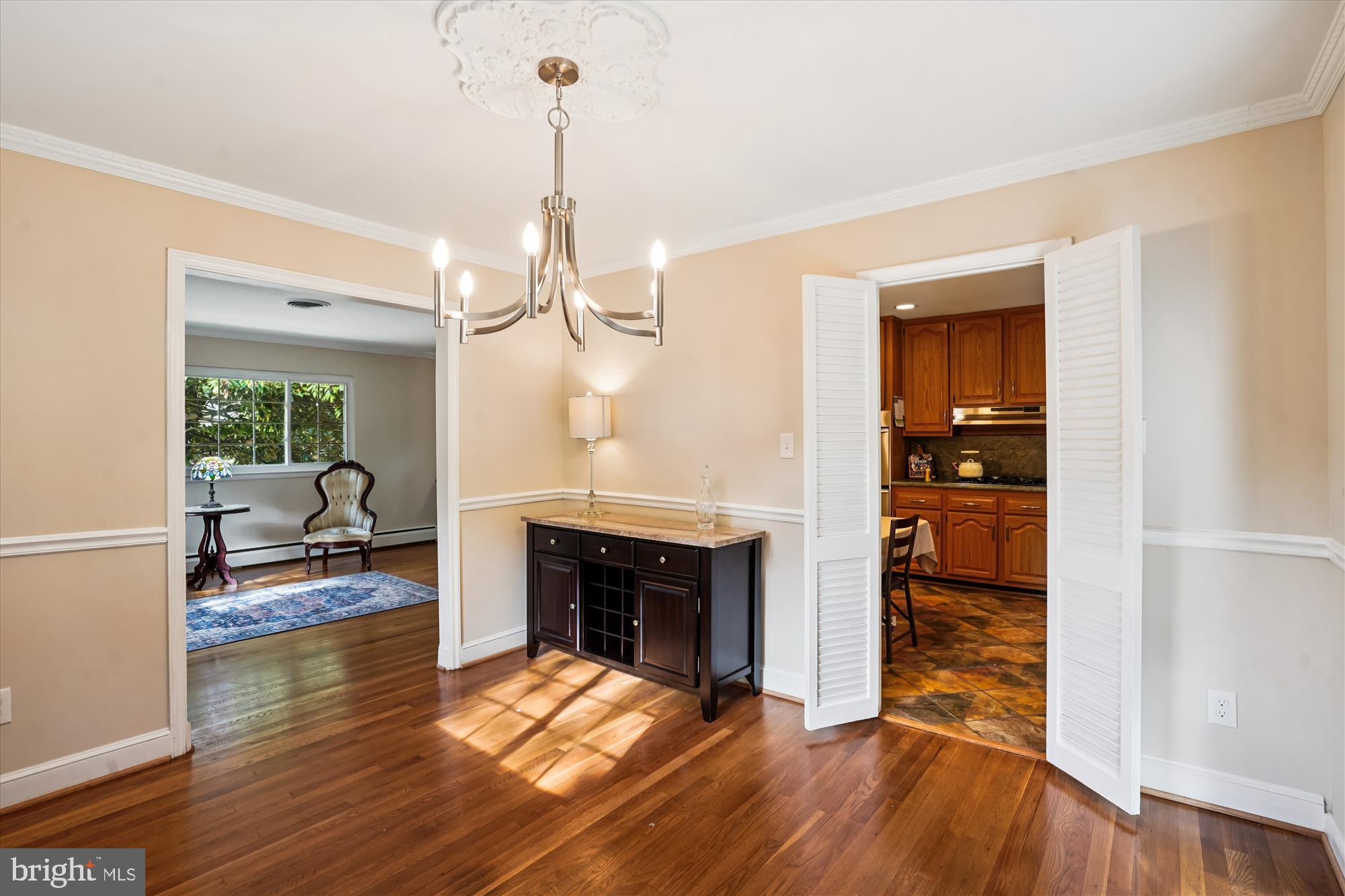 6216 Rockhurst Road Bethesda, MD 20817 - Photo 13 of 52 a living room with furniture and a fireplace