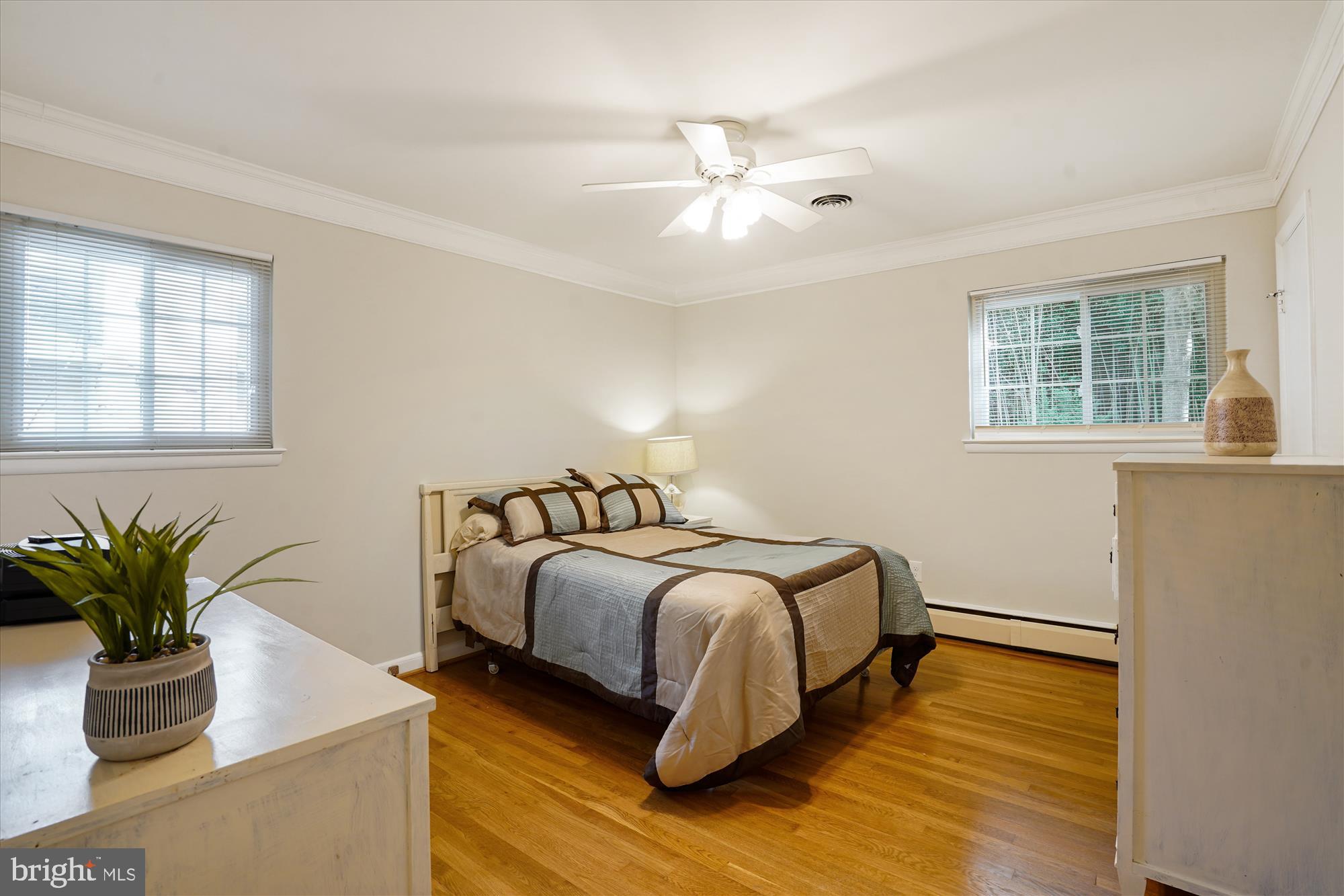 6216 Rockhurst Road Bethesda, MD 20817 - Photo 24 of 52 a bedroom with a bed and window