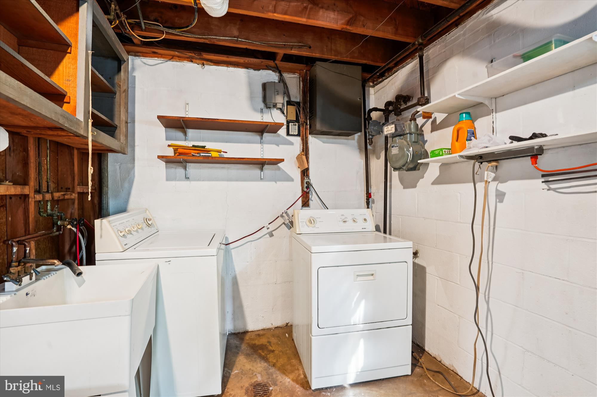 6216 Rockhurst Road Bethesda, MD 20817 - Photo 37 of 52 a utility room with dryer and washer