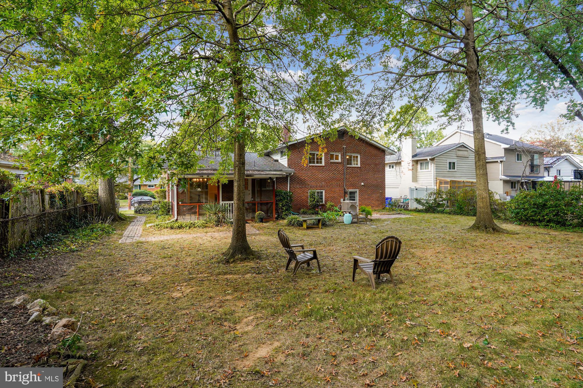 6216 Rockhurst Road Bethesda, MD 20817 - Photo 7 of 52 a view of a house with backyard and a tree
