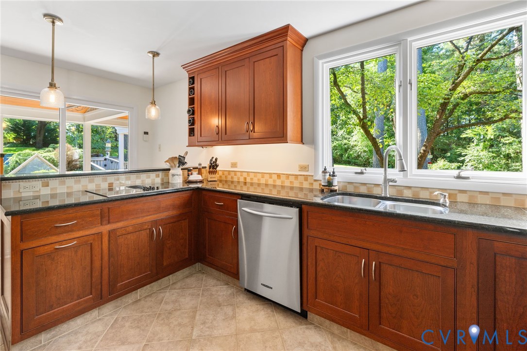 281 Echo Meadows Road Rockville, VA 23146 - Photo 16 of 49 a kitchen with granite countertop sink and cabinets