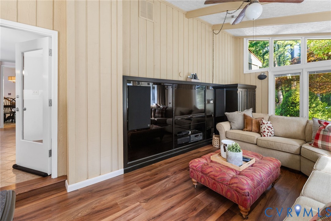 281 Echo Meadows Road Rockville, VA 23146 - Photo 21 of 49 a living room with furniture fireplace and a large window