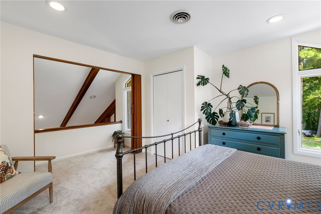 281 Echo Meadows Road Rockville, VA 23146 - Photo 27 of 49 a bedroom with a bed and a dresser