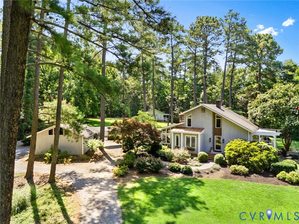 281 Echo Meadows Road Rockville, VA 23146 - Photo 3 of 49 a house view with a garden space